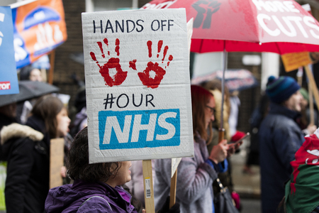 LONDON, UK - February 3rd 2018: Protesters and campaigners on a save the NHS march in central Londonのeditorial素材