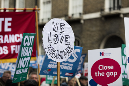 LONDON, UK - February 3rd 2018: Protesters and campaigners on a save the NHS march in central Londonのeditorial素材