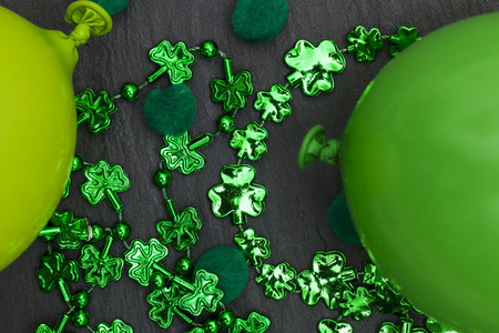 St Patricks day background with green balloons and shamrockの写真素材