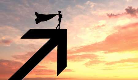 Silhouette of a superhero business woman wearing a cape against a bright sky. 3D Renderingの写真素材