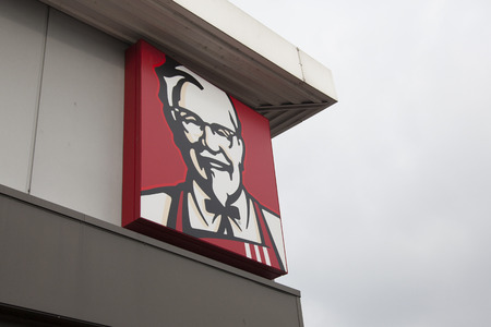 LONDON, UK - February 21st 2018: KFC fast food signage. KFC is an american fast food company that specializes in chickenのeditorial素材