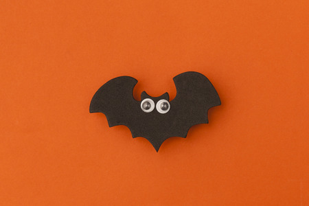Halloween bat character shape with funny googly eyes