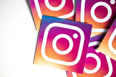 OXFORD, UK - NOVEMBER 17th 2016: A collection of Instagram logos printed onto paper. Instagram is a...
