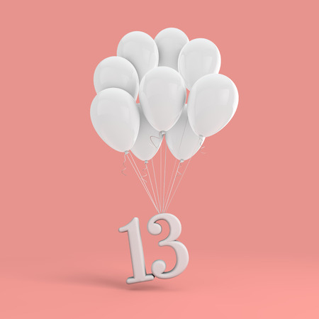 Number 13 party celebration. Number attached to a bunch of white balloonsの写真素材
