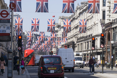 LONDON, UK - MAY 16th 2018: Union Jack flags hang in Regent Street, Central London in preperation...
