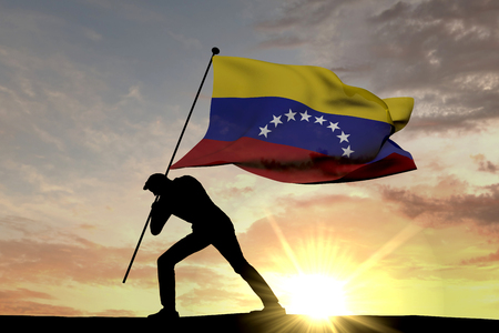 Venezuela flag being pushed into the ground by a male silhouette. 3D Renderingの写真素材