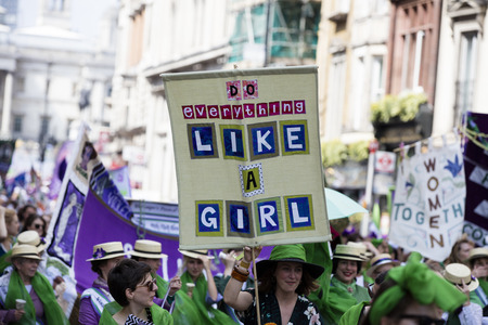 LONDON, UK - JUNE 10th 2018: Thousands of woman and girls march in London celebrating 100 years of the women's vote and gender equality, organised by 14-18 Now and artichoke.のeditorial素材