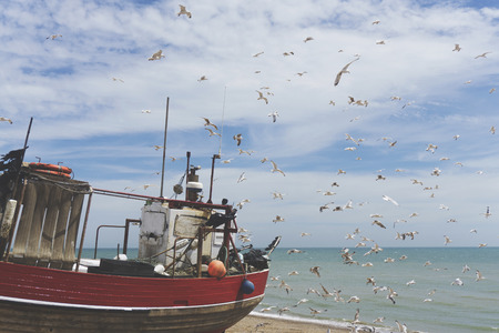 A fishing boat on the coast in Hastings, UKの写真素材