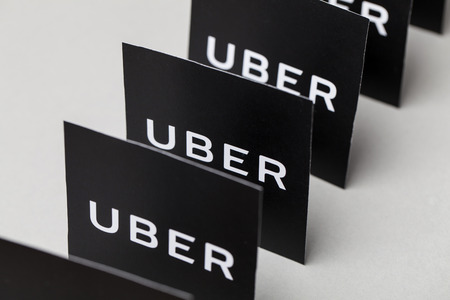 London, UK - MARCH 23rd 2017: A photograph of the Uber logo. Uber is a popular taxi style transport service application, founded in 2009のeditorial素材