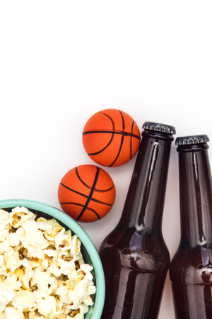Baasketball match party. Beer bottle with basketball and popcornの写真素材