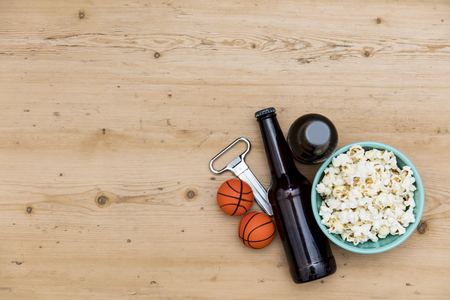 Baasketball match party. Beer bottle with basketball and popcornの写真素材