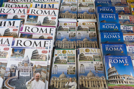 ROME, ITALY - JUNE 16th 2018: Tourist travel guide books for Rome on sale at a marketのeditorial素材
