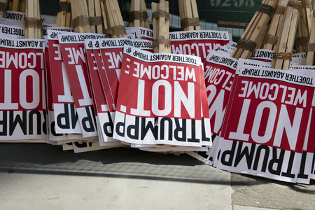 LONDON, UK - July 14th 2018: A collection of placards in central London to demonstrate against...