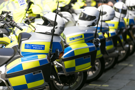 LONDON, UK - July 14th 2018: A group of London Metropolitan police motorbikes parked in a line
