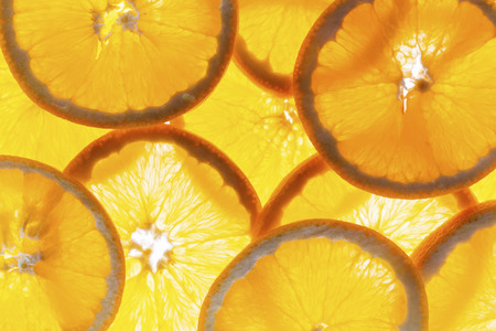 Slices of fresh orange background.の写真素材