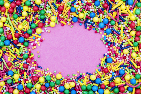 Colourful candy cake decorative sprinkles backgroundの写真素材
