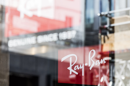 LONDON, UK - JULY 31th 2018: Ray-ban sunglasses branding in a shop front on Oxford Street in central London.のeditorial素材