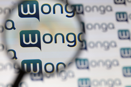 LONDON, UK - AUGUST 28th 2018: Wonga payday lender logo on a computer screen. Wonga is a payday loan company offering short-term, high-cost credit.のeditorial素材