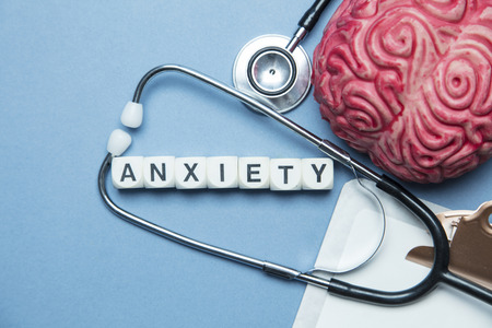 Mental health concept. human brain on a blue backgroundの写真素材