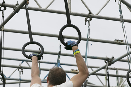 LONDON, UK - SEPTEMBER 8th 2018: Participants take part in a rough runner obstacle course race in...