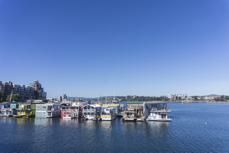 VICTORIA, CANADA - SEPTEMBER 26th 2018: Colourful floating homes at the fisherman's wharf in...