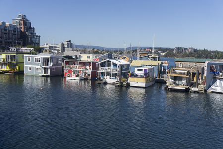 VICTORIA, CANADA - SEPTEMBER 26th 2018: Colourful floating homes at the fisherman's wharf in Victoria, Canadaのeditorial素材