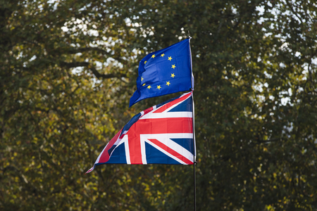 European union and British Union jack flags flying together. Brexit concept