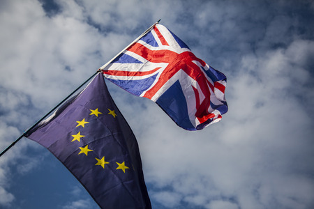 European union and British Union jack flags flying together. Brexit concept