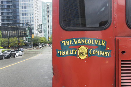 Vancouver, CANADA - SEPTEMBER 10th 2018: Vancouver Trolley Company sign on a red bus. A Vancouver...