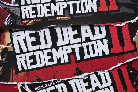 LONDON, UK - OCTOBER 24th 2018: Advert for Red Dead Redemption 2 video game made by Rockstar Games printed in a magazineのeditorial素材