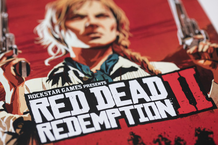 LONDON, UK - OCTOBER 24th 2018: Advert for Red Dead Redemption 2 video game made by Rockstar Games printed in a magazineのeditorial素材
