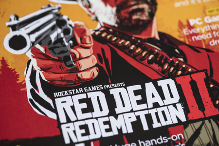 LONDON, UK - OCTOBER 24th 2018: Advert for Red Dead Redemption 2 video game made by Rockstar Games printed in a magazineのeditorial素材