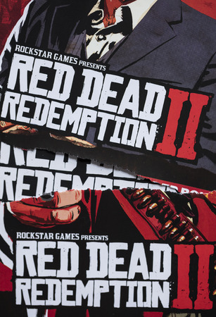 LONDON, UK - OCTOBER 24th 2018: Advert for Red Dead Redemption 2 video game made by Rockstar Games printed in a magazineのeditorial素材