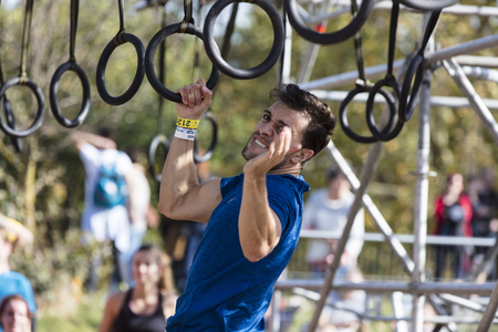 LONDON, UK - September 13th 2018: Participants take part in a Tough Mudder 5K obstacle race in London.のeditorial素材