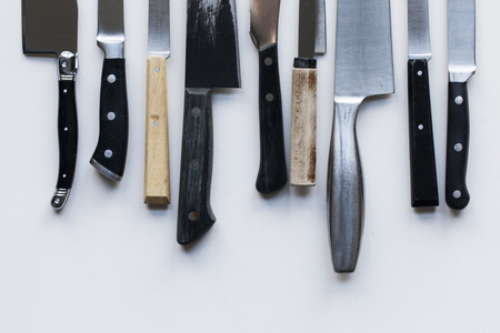 A variety of knives on a plain background. Knife crime conceptの写真素材