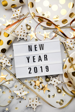 New Year 2019 lightbox celebration message with luxury gold party decorationsの写真素材