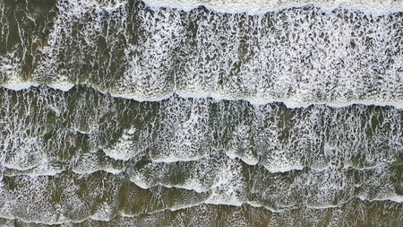 Aerial overhead view of beautiful breaking ocean waves