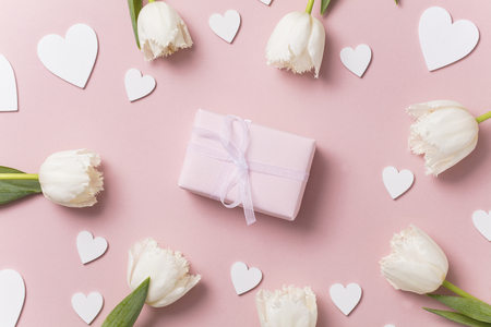 Pink celebration background, flowers, hearts and gift.の写真素材