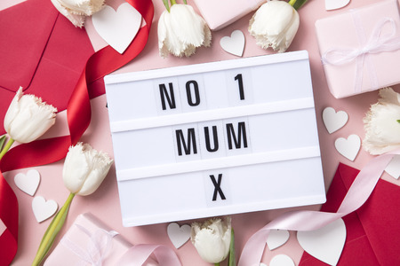 Mother's Day lightbox message with white flowers and heartsの写真素材