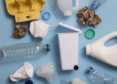 Top view of rubbish for recycling on a blue backgroundの写真素材