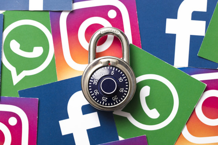 LONDON, UK - FEBRUARY 8th 2019: Facebook, Instagram and Whatsapp logos printed onto paper.