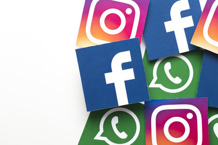 LONDON, UK - FEBRUARY 8th 2019: Facebook, Instagram and Whatsapp logos printed onto paper.