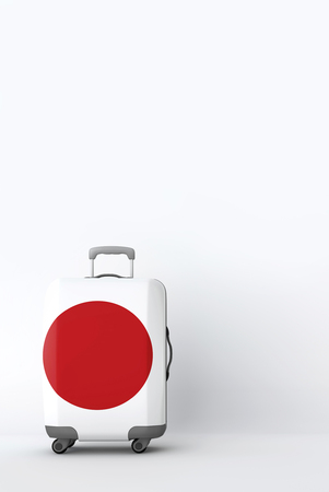Travel suitcase with the flag of Japan. Holiday destination. 3D Renderの写真素材