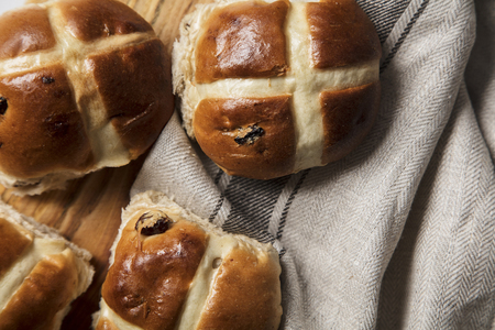 Traditional hot cross buns with raisins. Easter springtime treat
