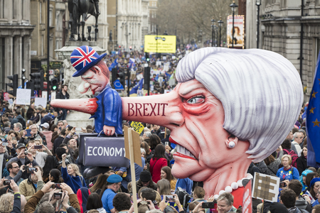 LONDON, UK - March 23rd, 2019: A political satire sculpture of Theresa May made by artist Jacques Tilly at the Put it to the People March in Londonのeditorial素材