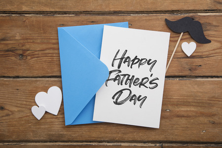 Happy Fathers day card and envelope with mustache and love heartsの写真素材