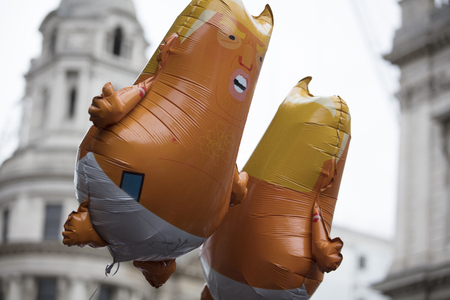 LONDON, UK - June 4th, 2019: Baby Donald Trump helium balloons during an Anti Trump rally in Central Londonのeditorial素材