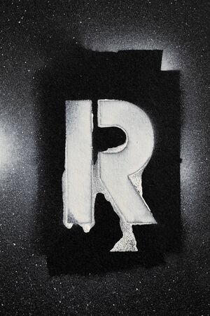 Letter R grunge spray paninted stencil fontの写真素材
