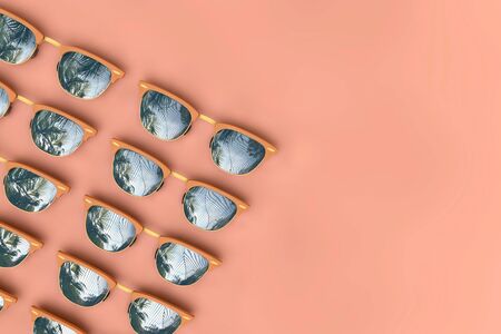 Summer sunglasses with tropical palm tree reflections. 3D Rendering