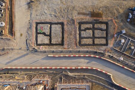 Aerial view over a construction site of new homes being builtの写真素材